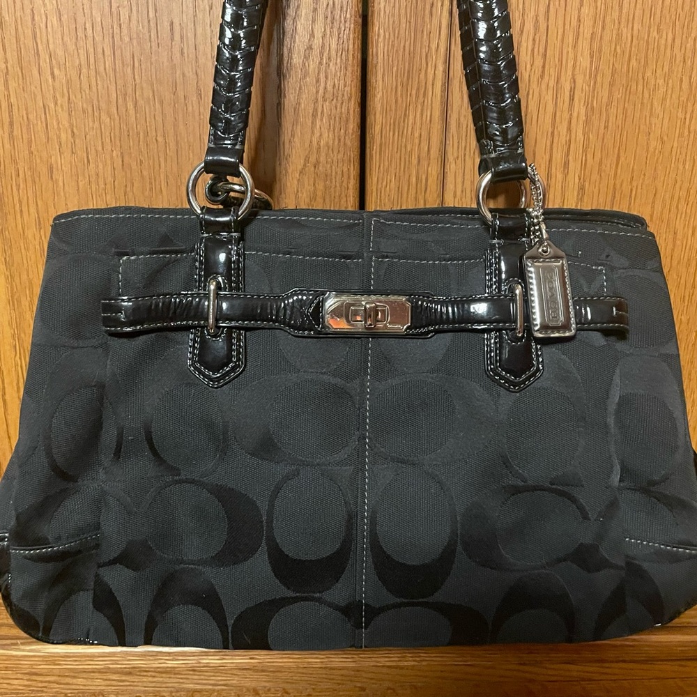 Coach purse and matching Coach wallet.